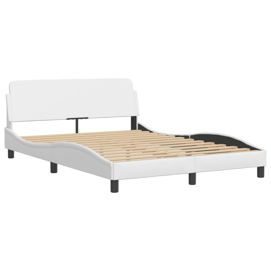 White upholstered bed frame with wooden slats and a double headboard
