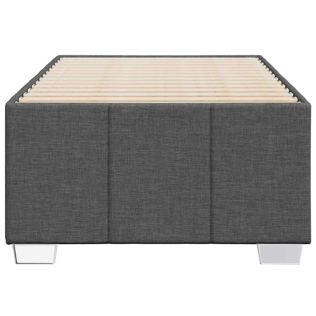 Dark grey upholstered divan bed base with wooden slats and silver legs
