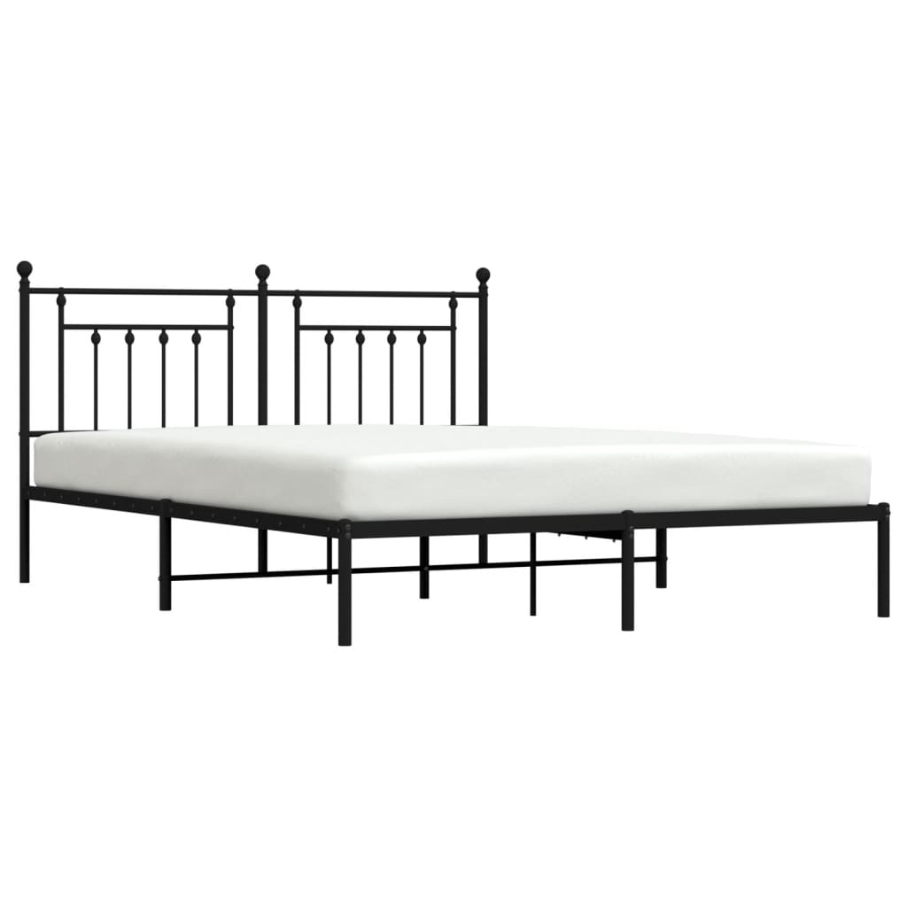 Queen size black metal bed frame with ornate headboard and footboard