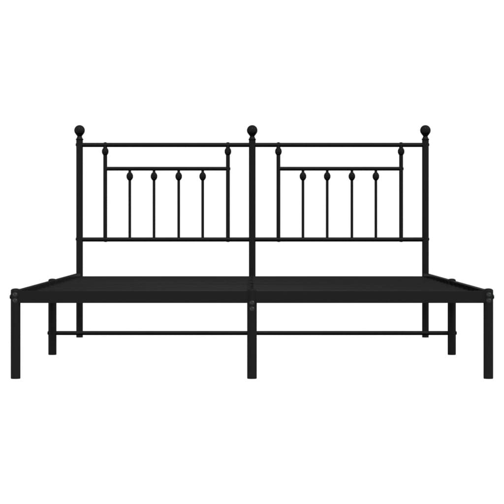 Black metal twin bed frame with a white mattress