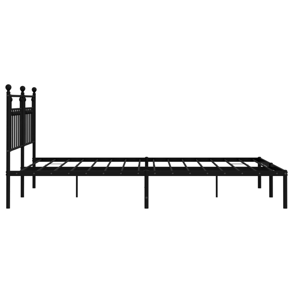 Black metal twin bed frame with decorative headboard and footboard