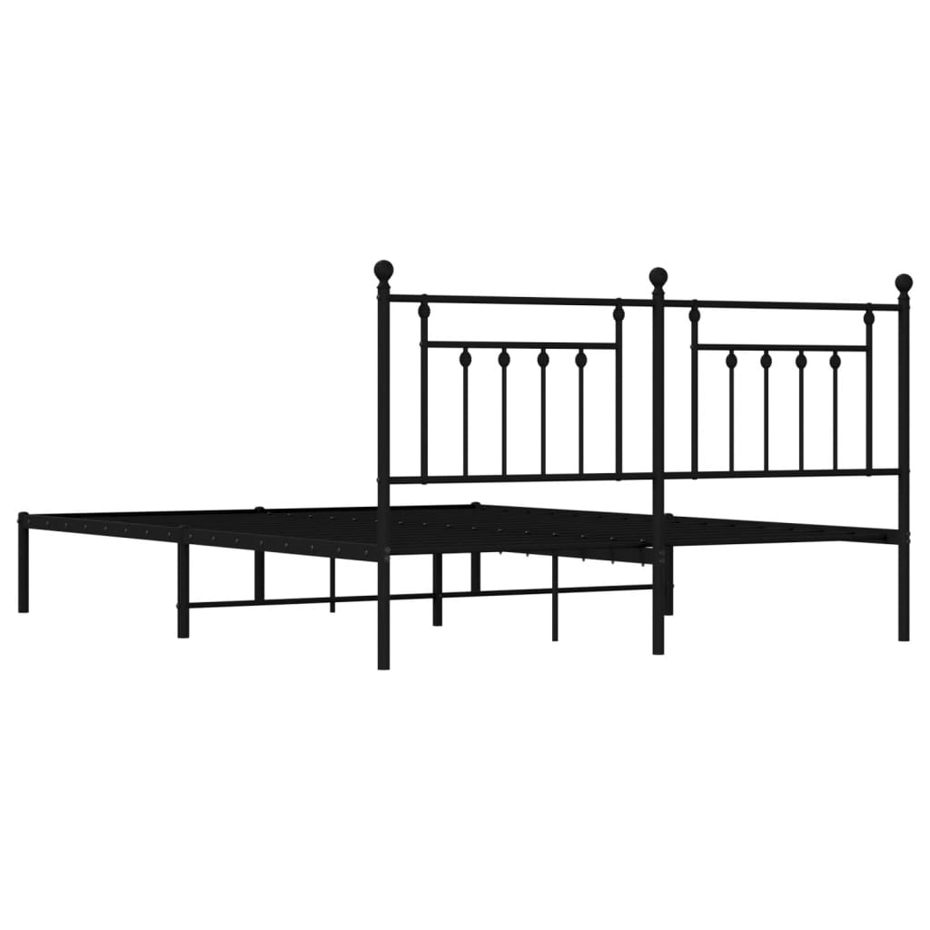 Black metal bed frame with decorative finials on the headboard