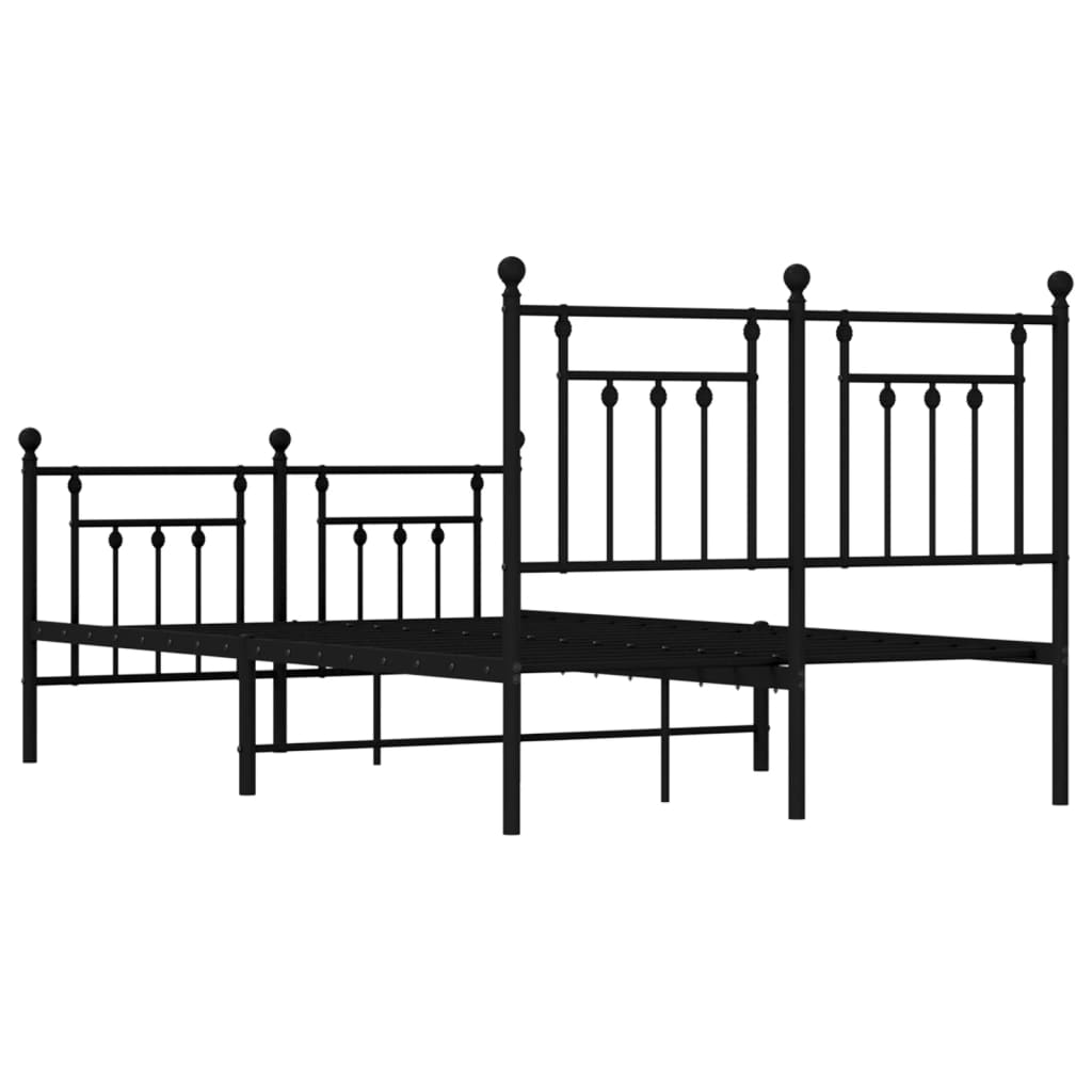 Black metal bed frame with decorative finials on headboard and footboard