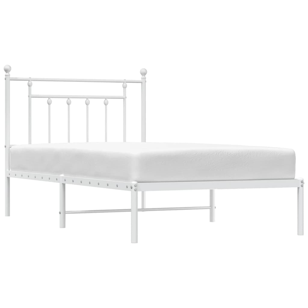 White metal bed frame with classic spindle headboard and footboard