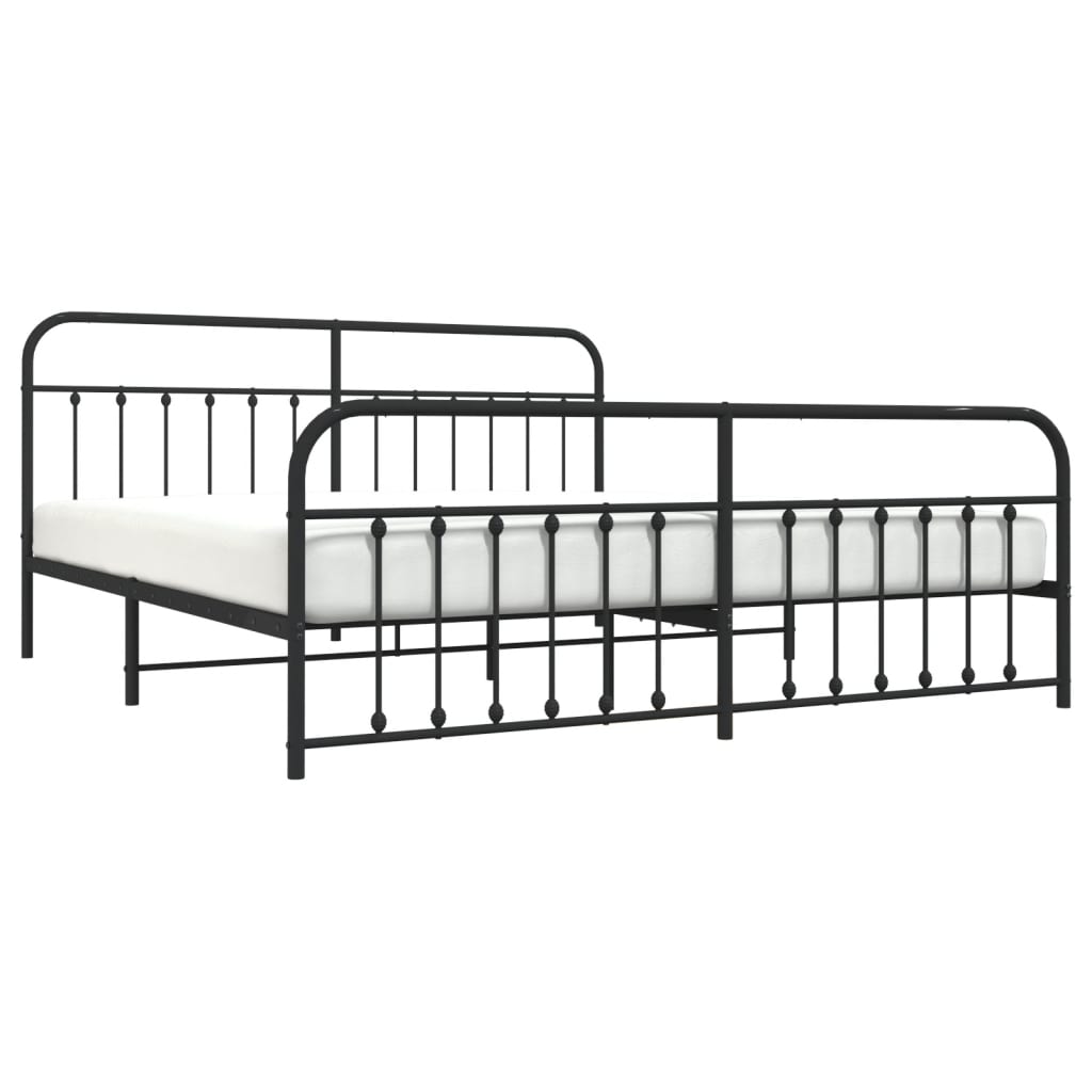 Black metal bed frame with ornate headboard and footboard