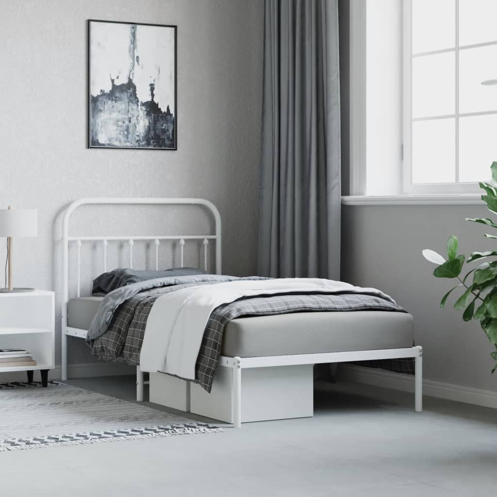 White metal twin bed frame with rounded headboard and footboard