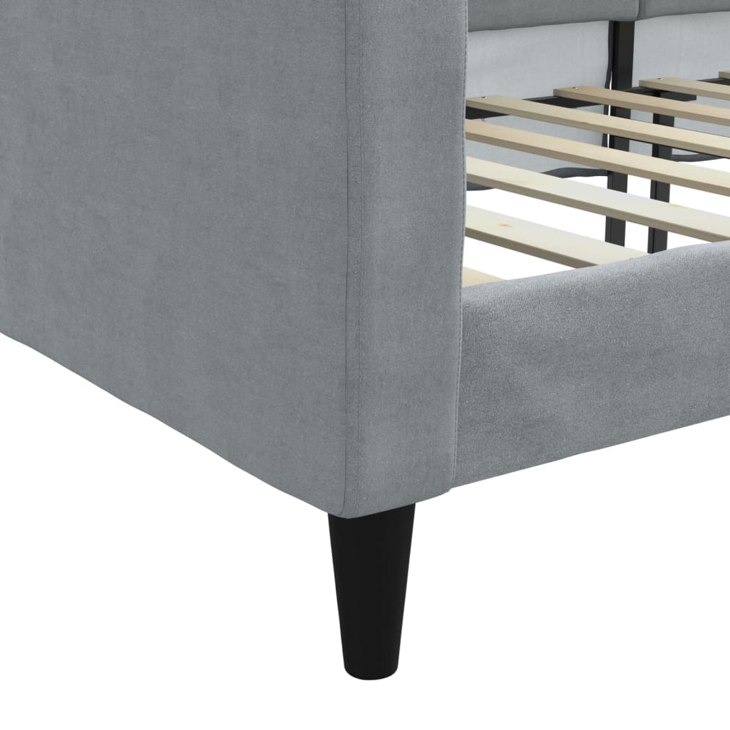 Gray fabric sofa seen from the back with black legs