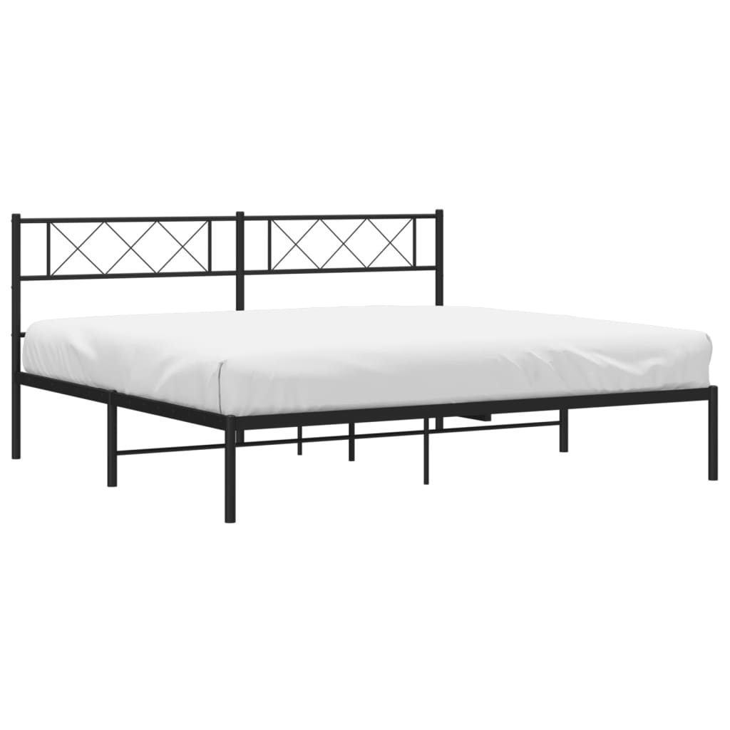 Black metal bed frame with a geometric patterned headboard and a white mattress
