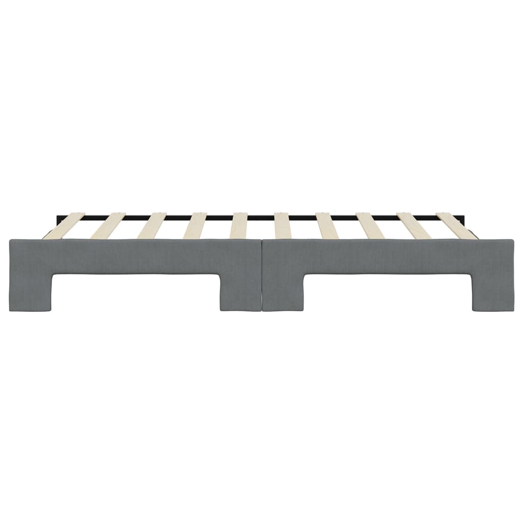Upholstered grey platform bed frame with wooden slats