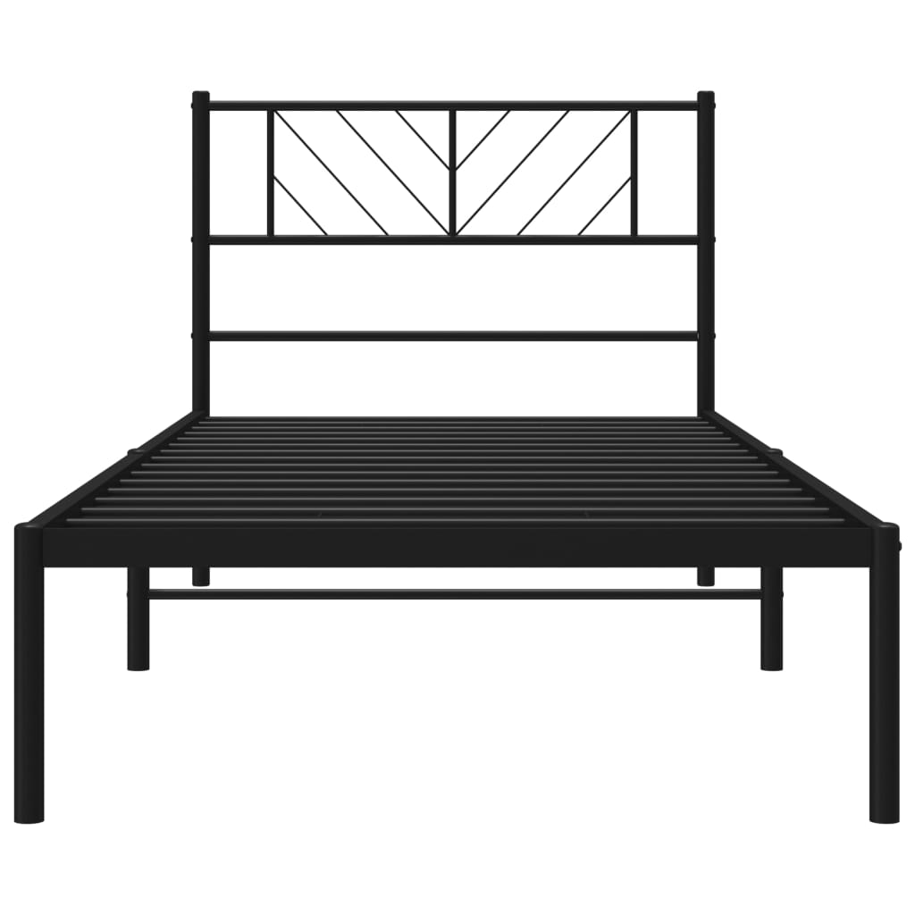 Black metal twin bed frame with geometric headboard and white mattress