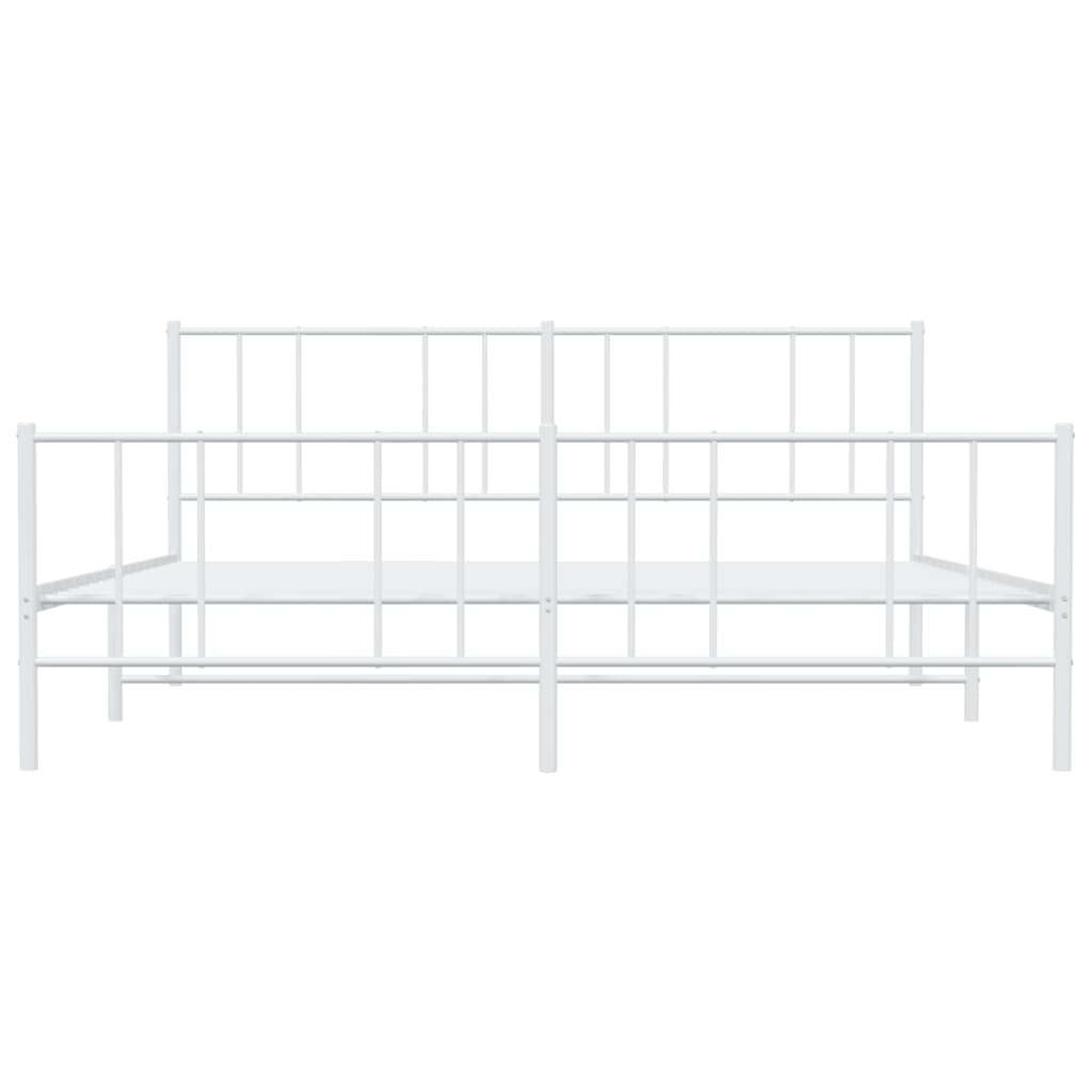 White metal bed frame with a white mattress