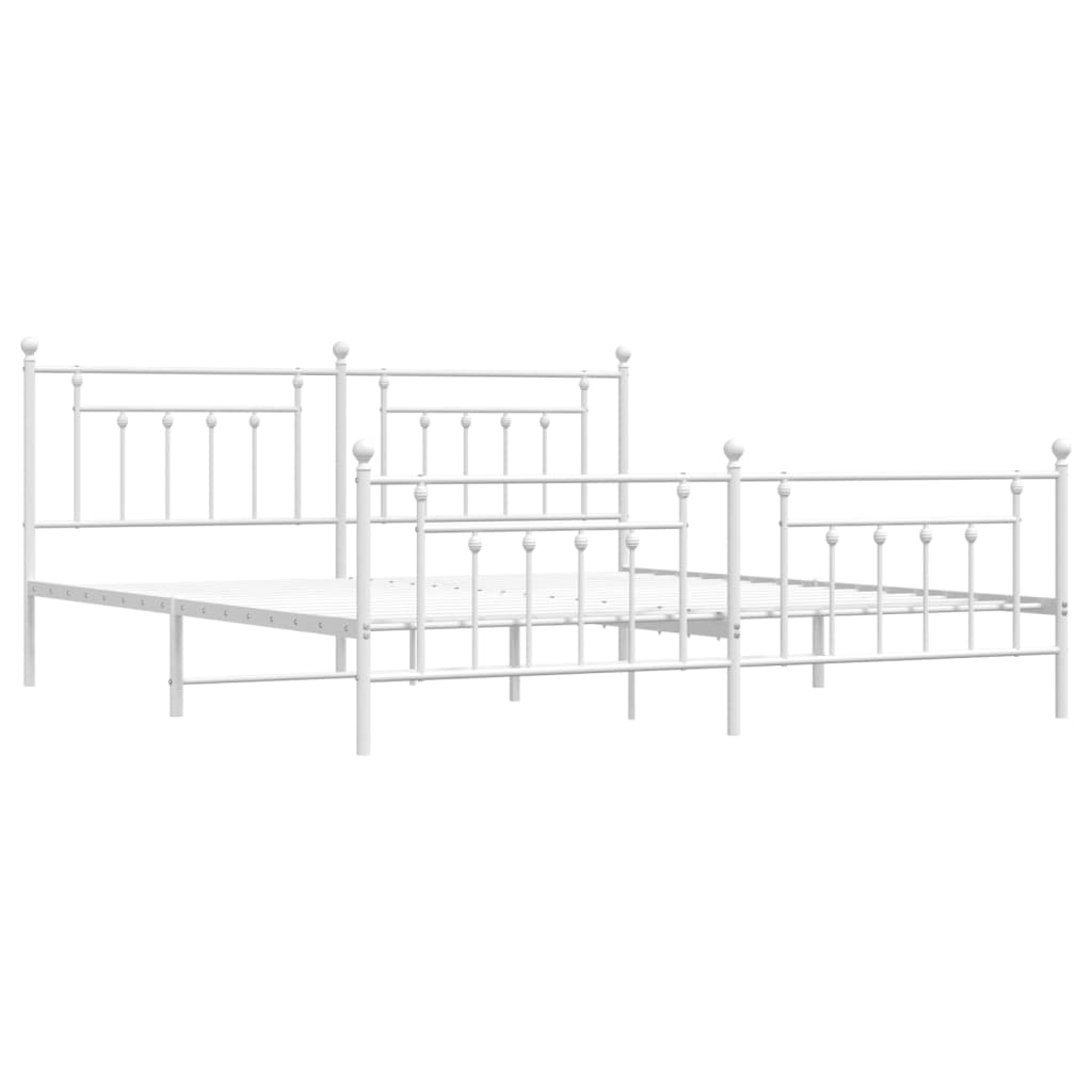 White metal bed frame with mattress and ornate headboard detail