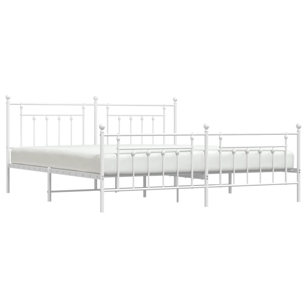 White metal twin bed frame with rounded finials and slatted headboard