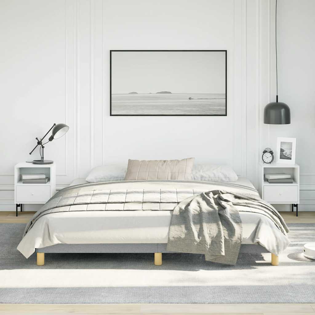 Modern queen bed frame with gray upholstery and wooden legs