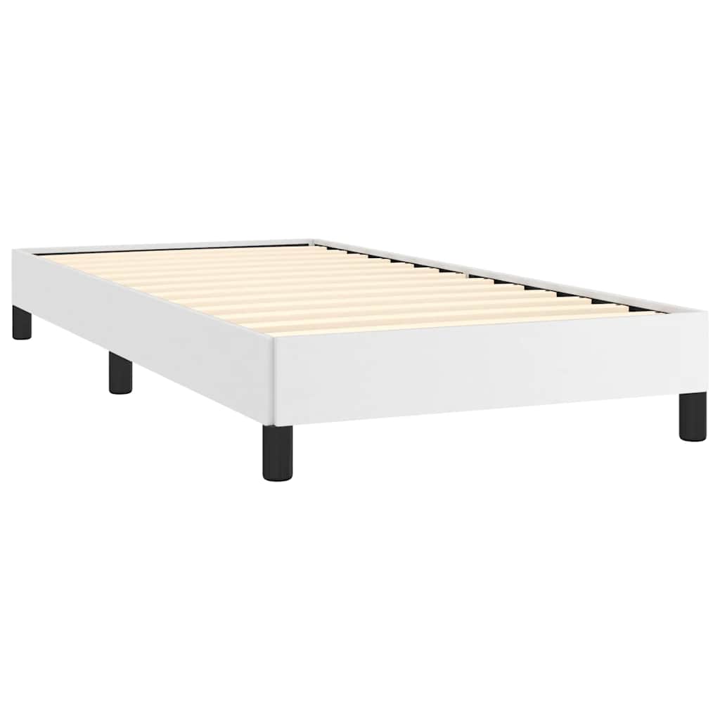 White upholstered twin bed frame with black legs