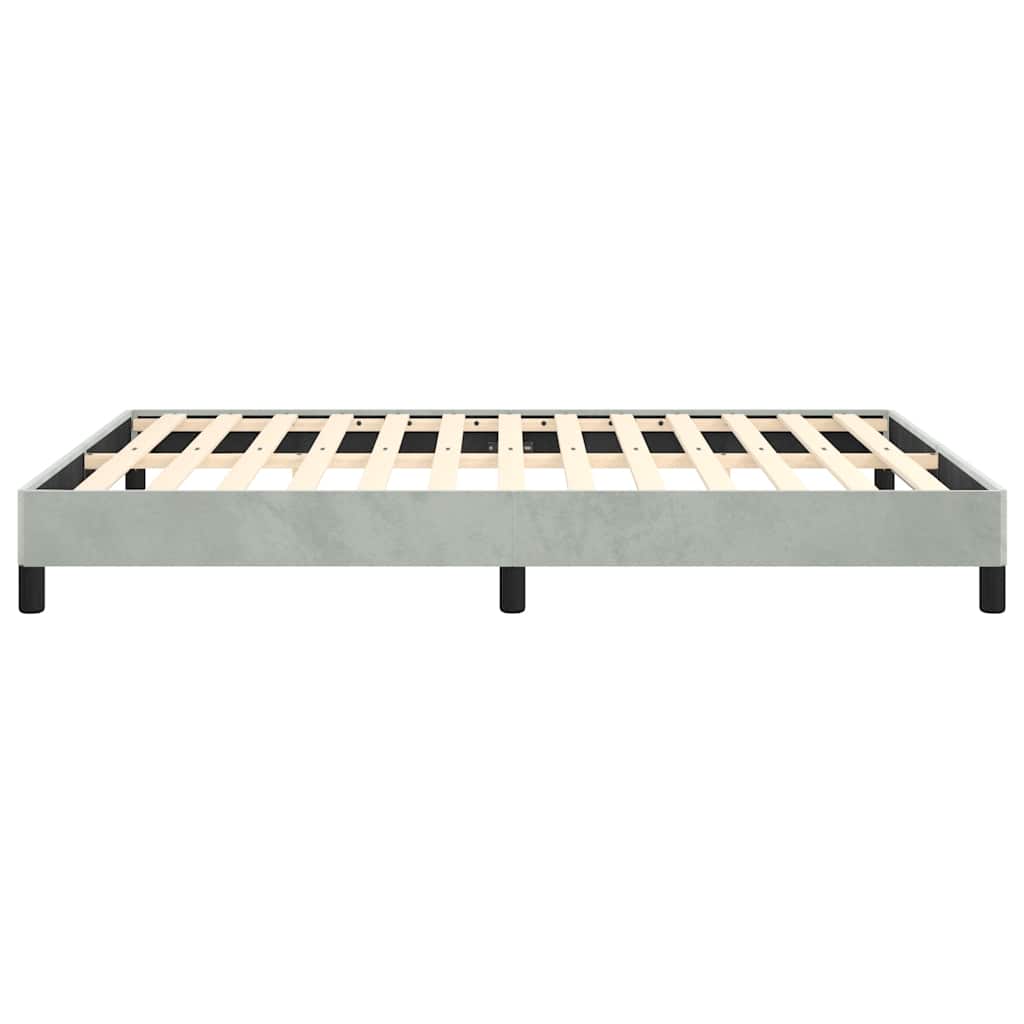 Light grey upholstered bed frame with wooden slats and black legs