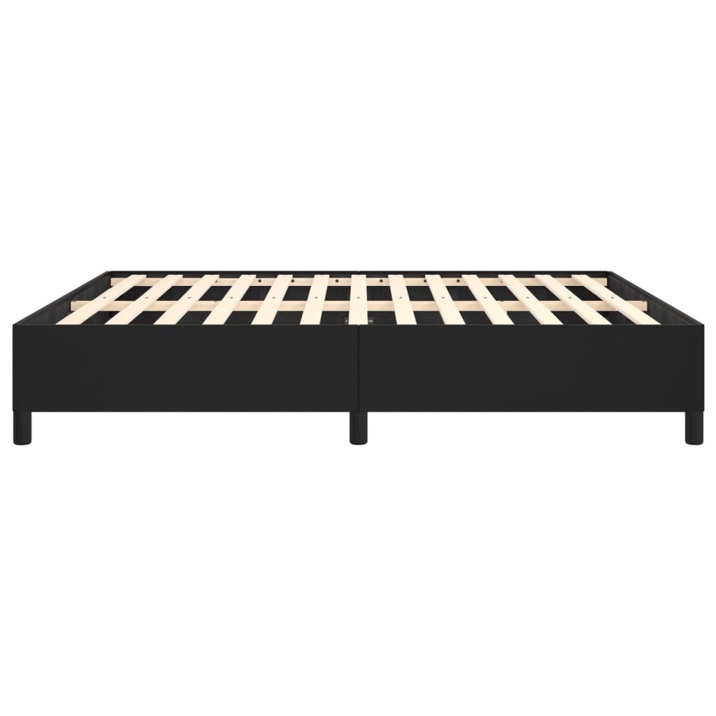 Black platform bed frame with wooden slats