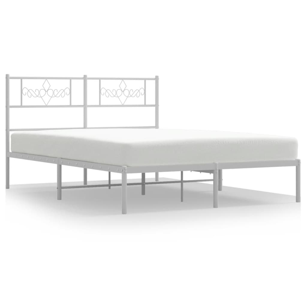 White metal bed frame with ornate headboard and mattress support slats