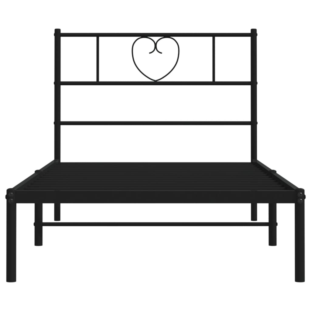 Black metal twin bed frame with heartshaped headboard detail