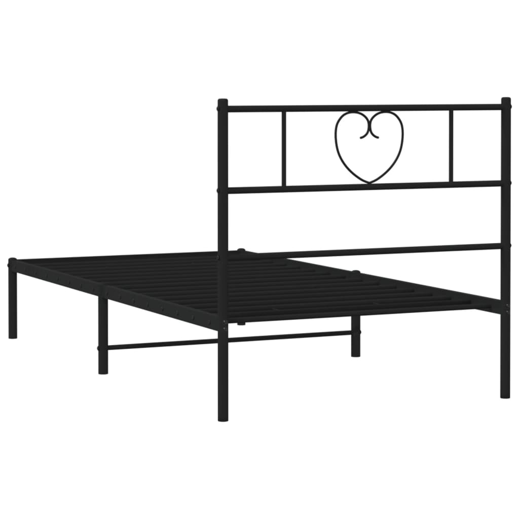 Black metal twin bed frame with heartshaped headboard detail