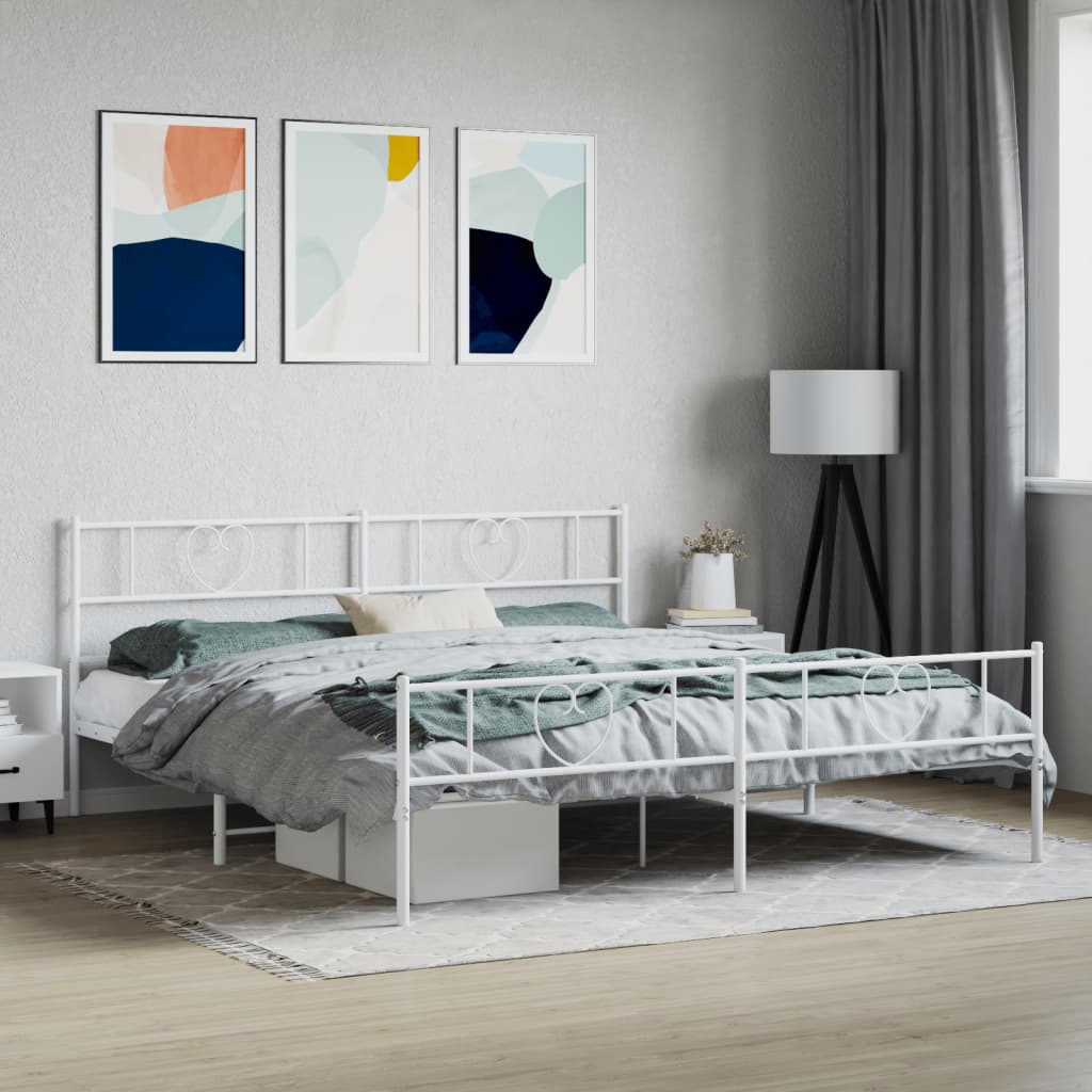 White metal twin bed frame with heart accents and grey bedding