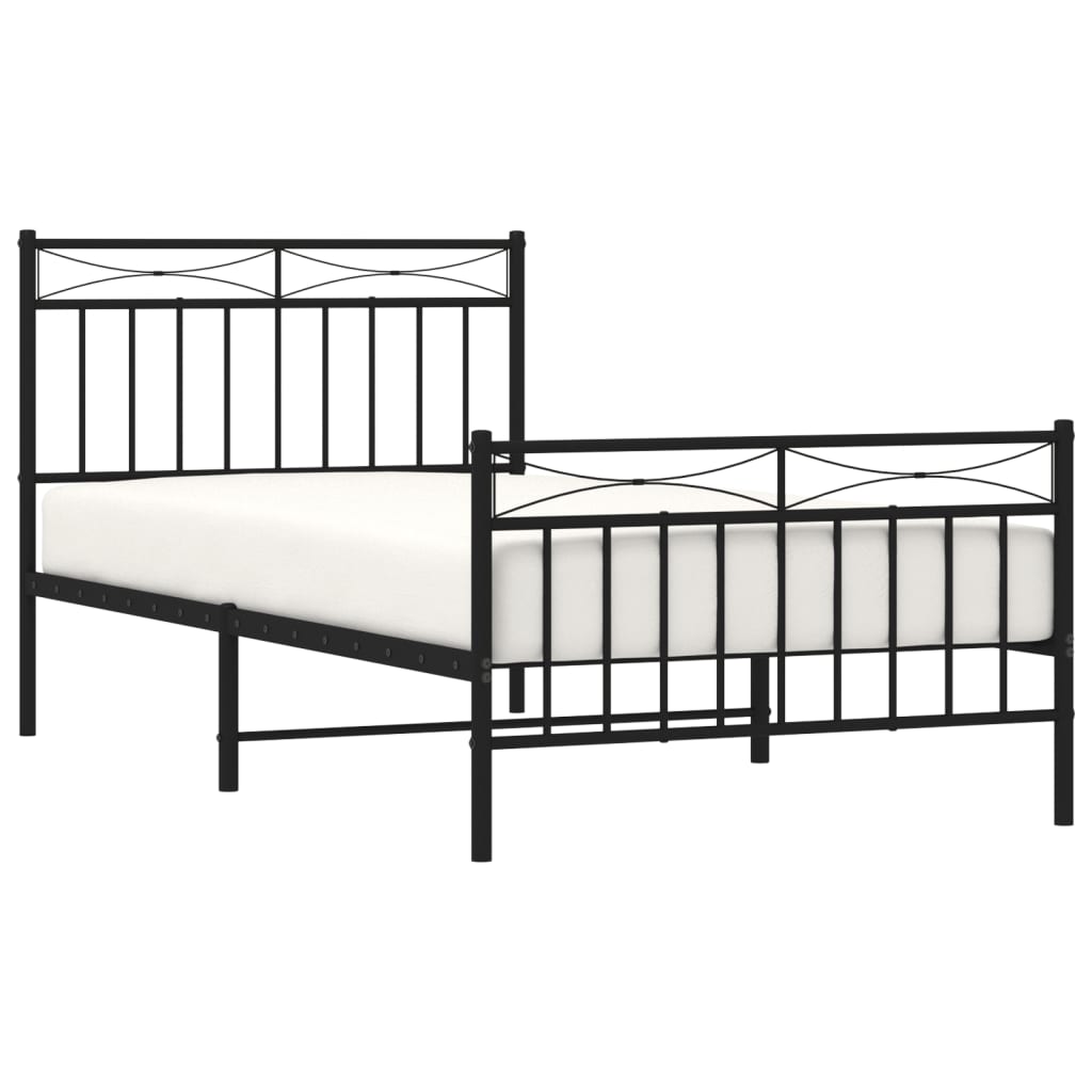 Black metal bed frame with ornate headboard and footboard