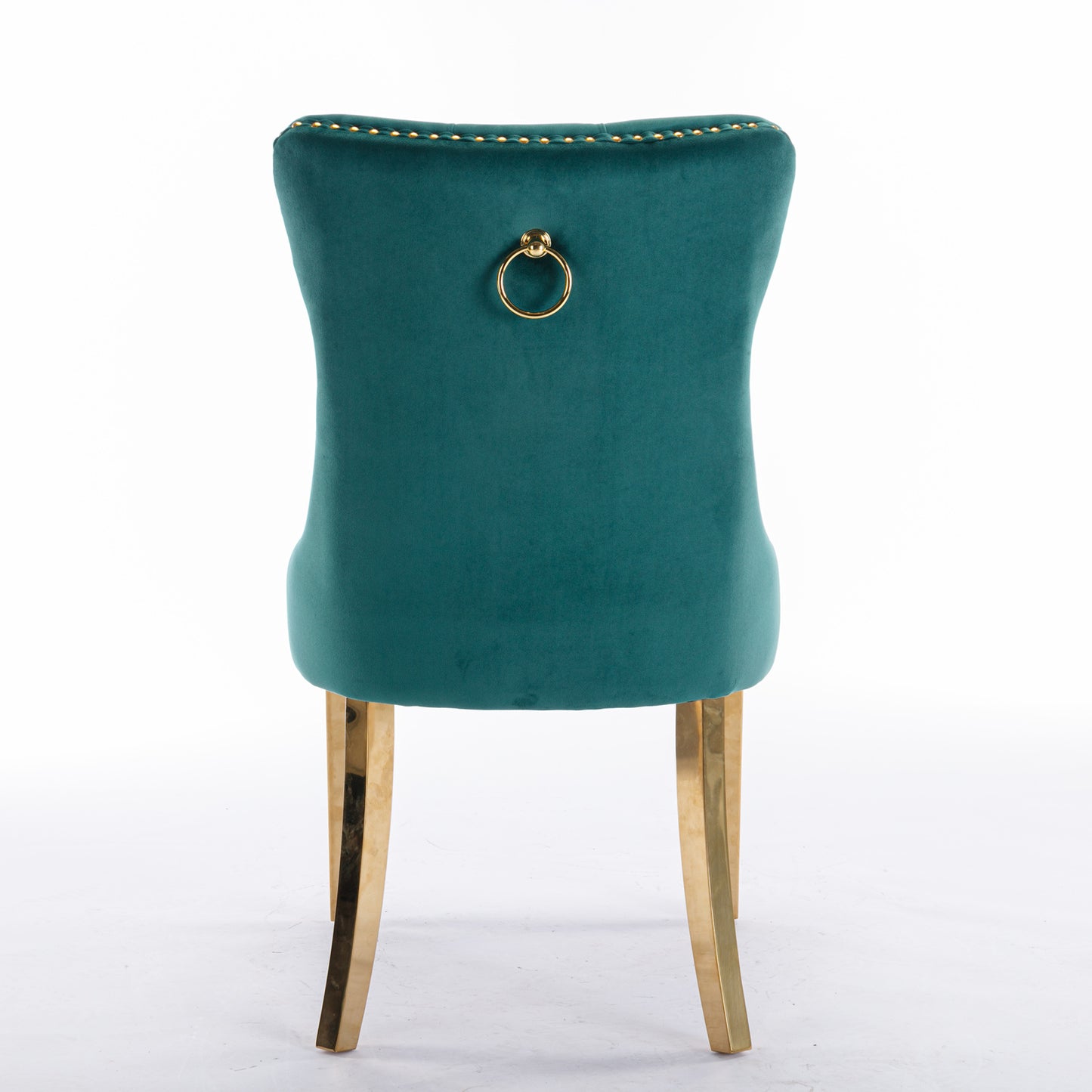 Deep green velvet dining chair with gold ring pull and studded trim