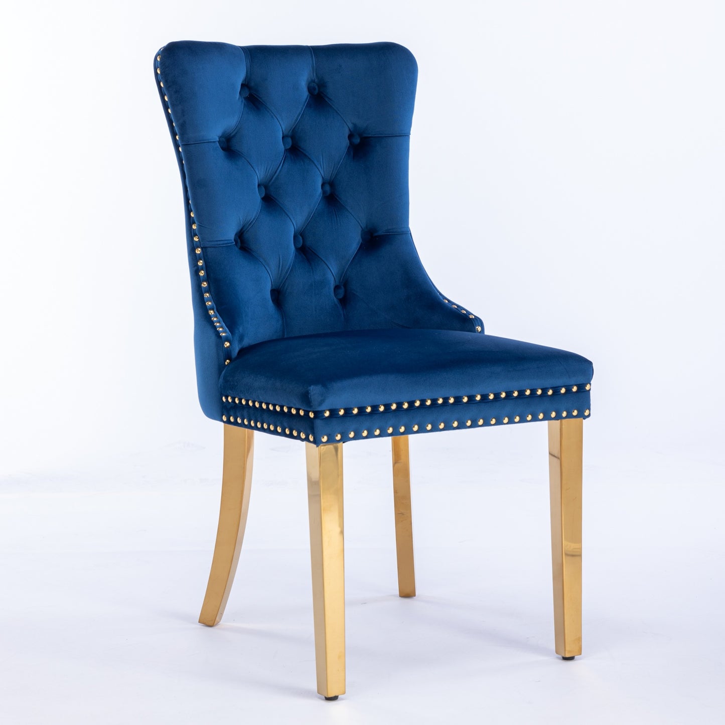 Deep blue velvet accent chair with gold nailhead trim and brass legs
