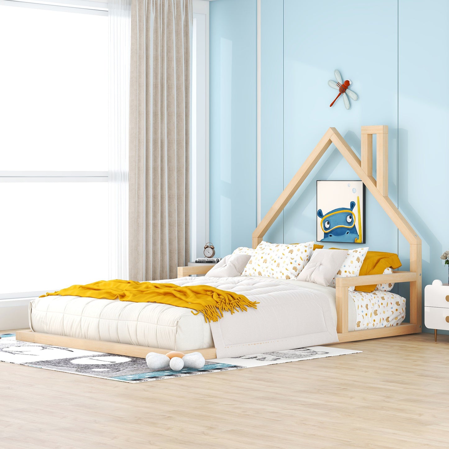 Wooden house bed frame with white bedding and yellow throw