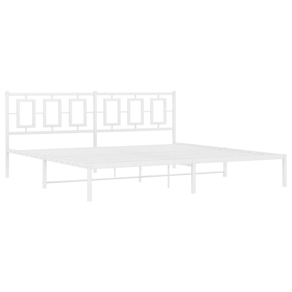 White metal bed frame with a geometric patterned headboard and bedding