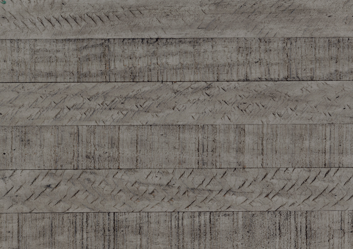 Closeup of weathered grey wood planks with textured grooves