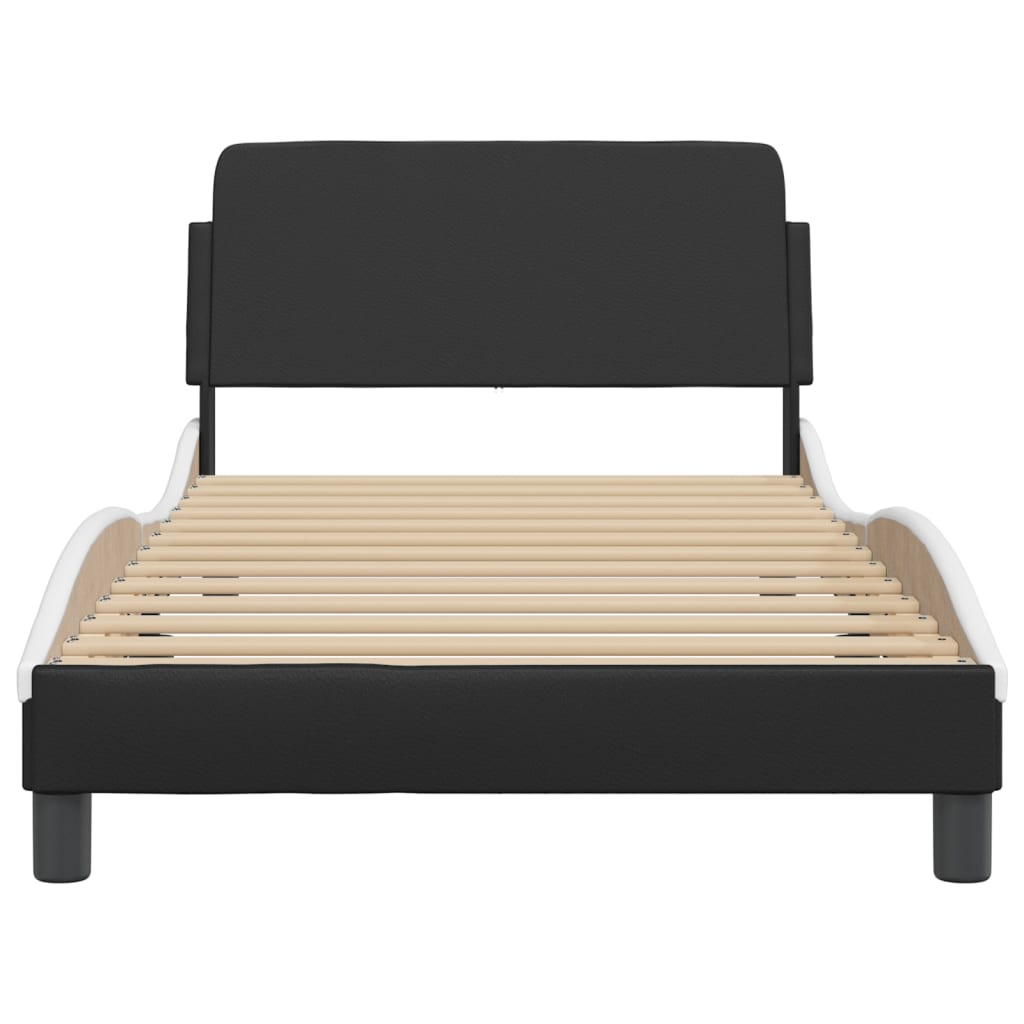 Black upholstered bed frame with curved white trim and slatted base