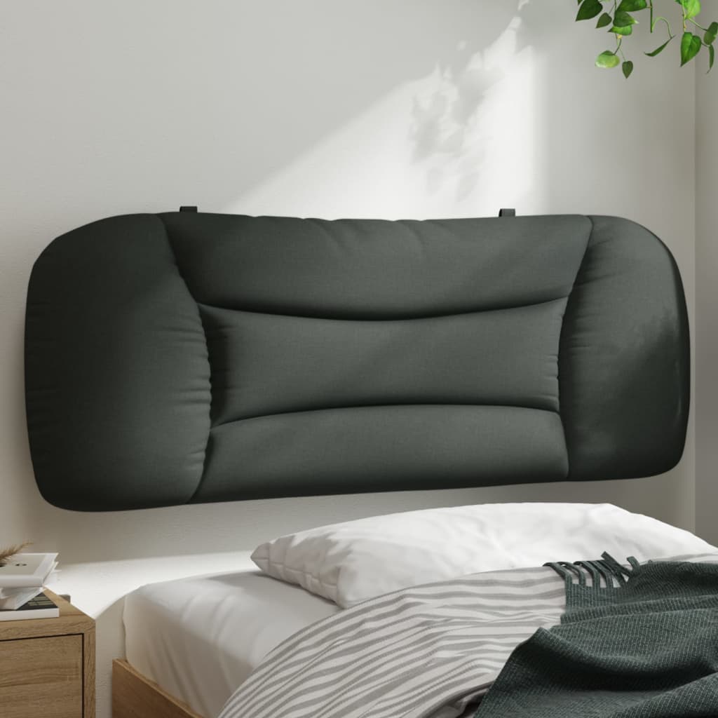 Dark grey upholstered headboard with quilted detailing