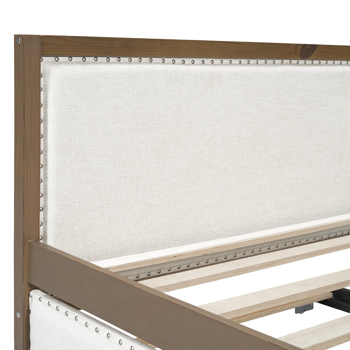 Rustic wooden bed frame with beige upholstered headboard and nailhead trim