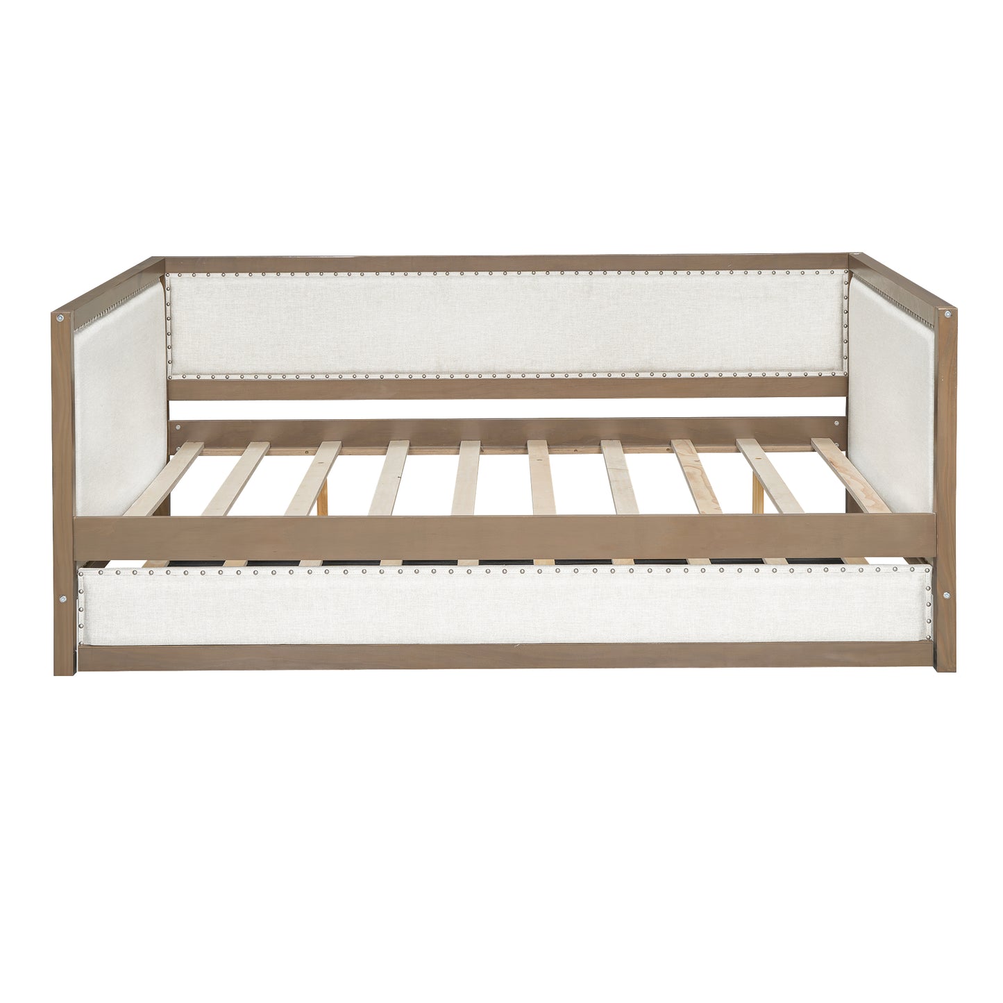 Tufted linen daybed with nailhead trim in a gray wash wood frame