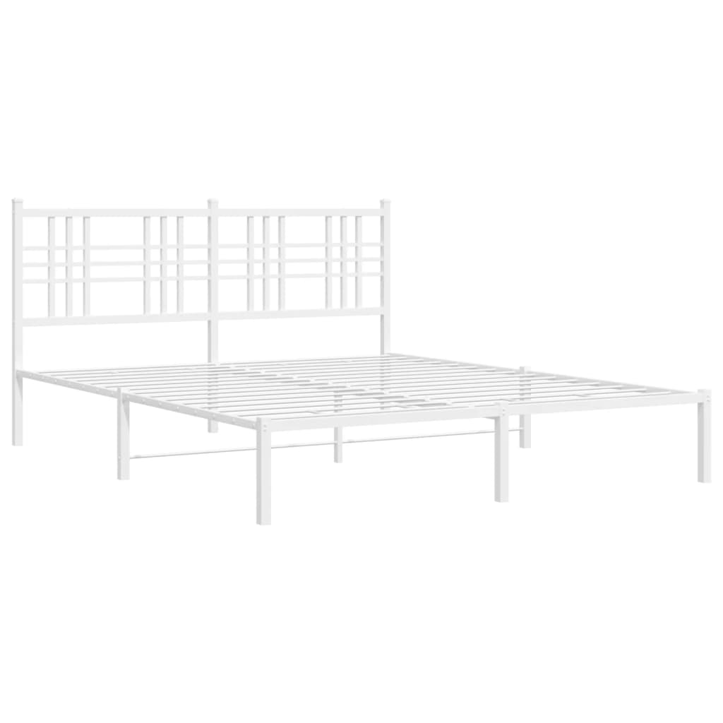 White metal bed frame with a geometric headboard and upholstered mattress