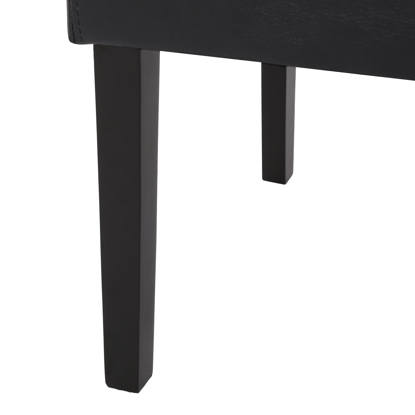 Black faux leather armchair legs detail