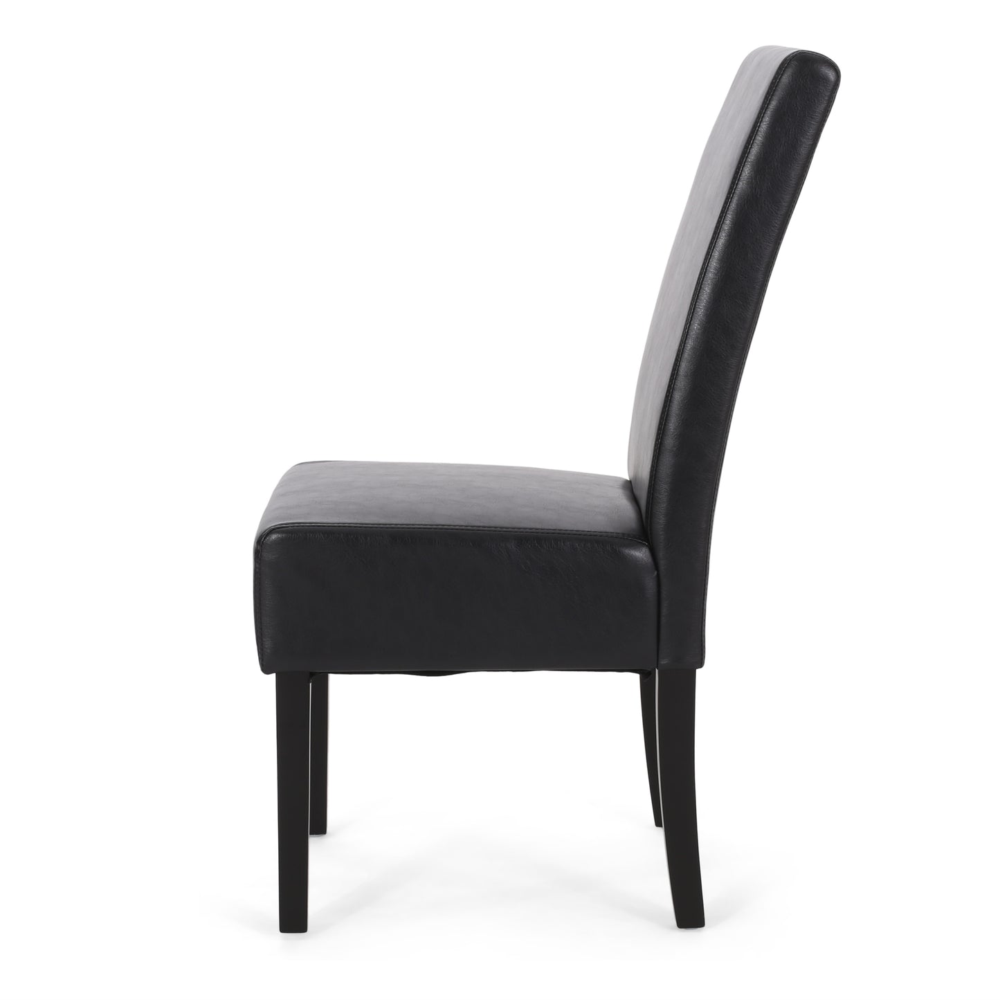 Side view of a black faux leather dining chair with tapered legs