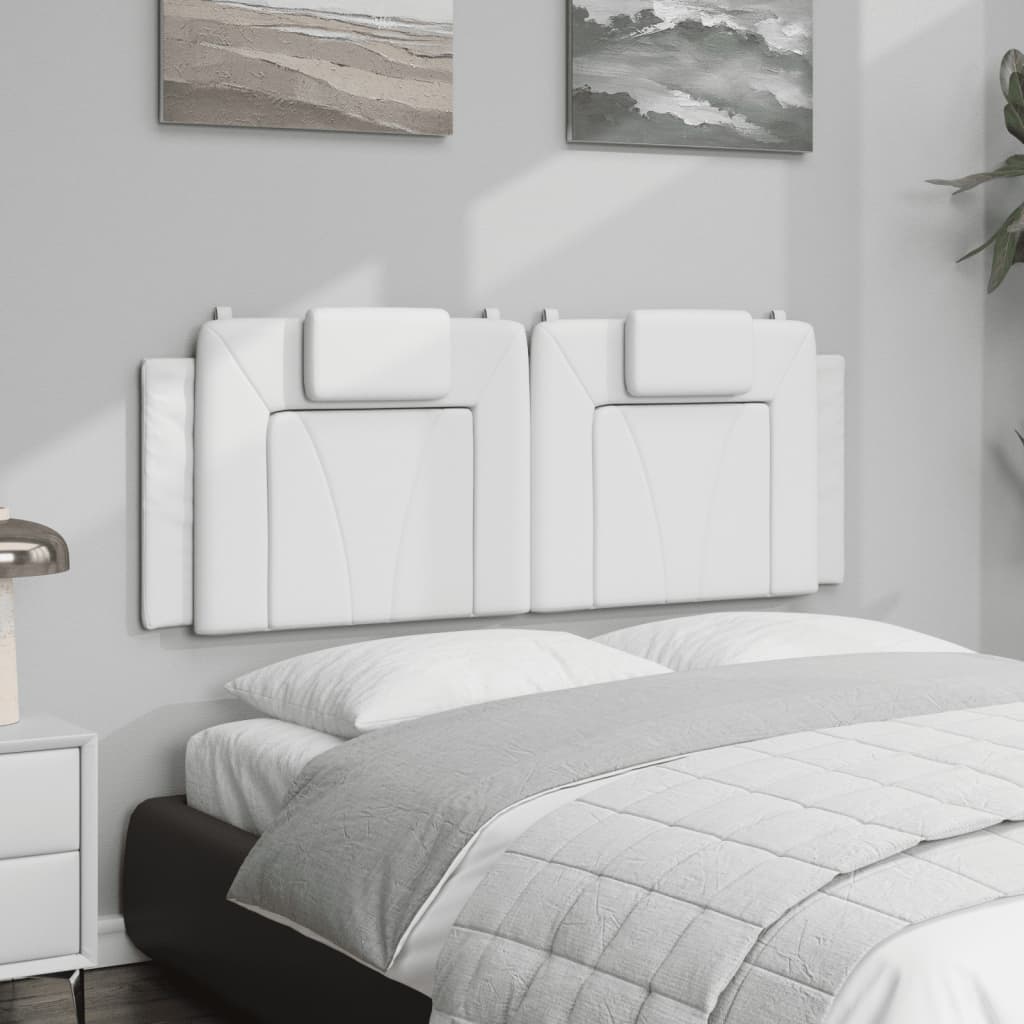 White leather sofa with adjustable headrests and plush cushions