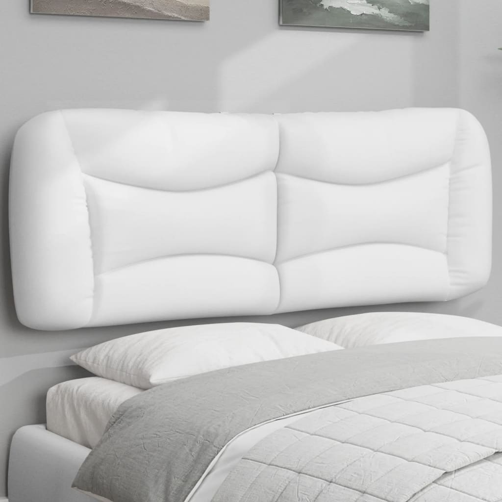 Plush white upholstered headboard with tufted cushioning for a modern bedroom