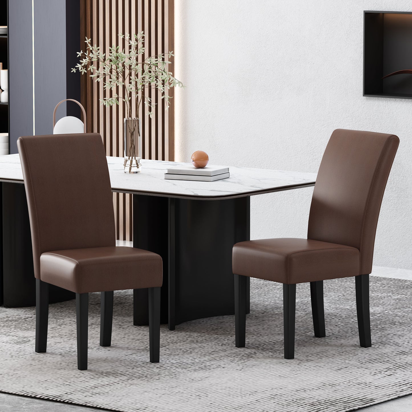 Two brown faux leather dining chairs with black wooden legs on a striped rug