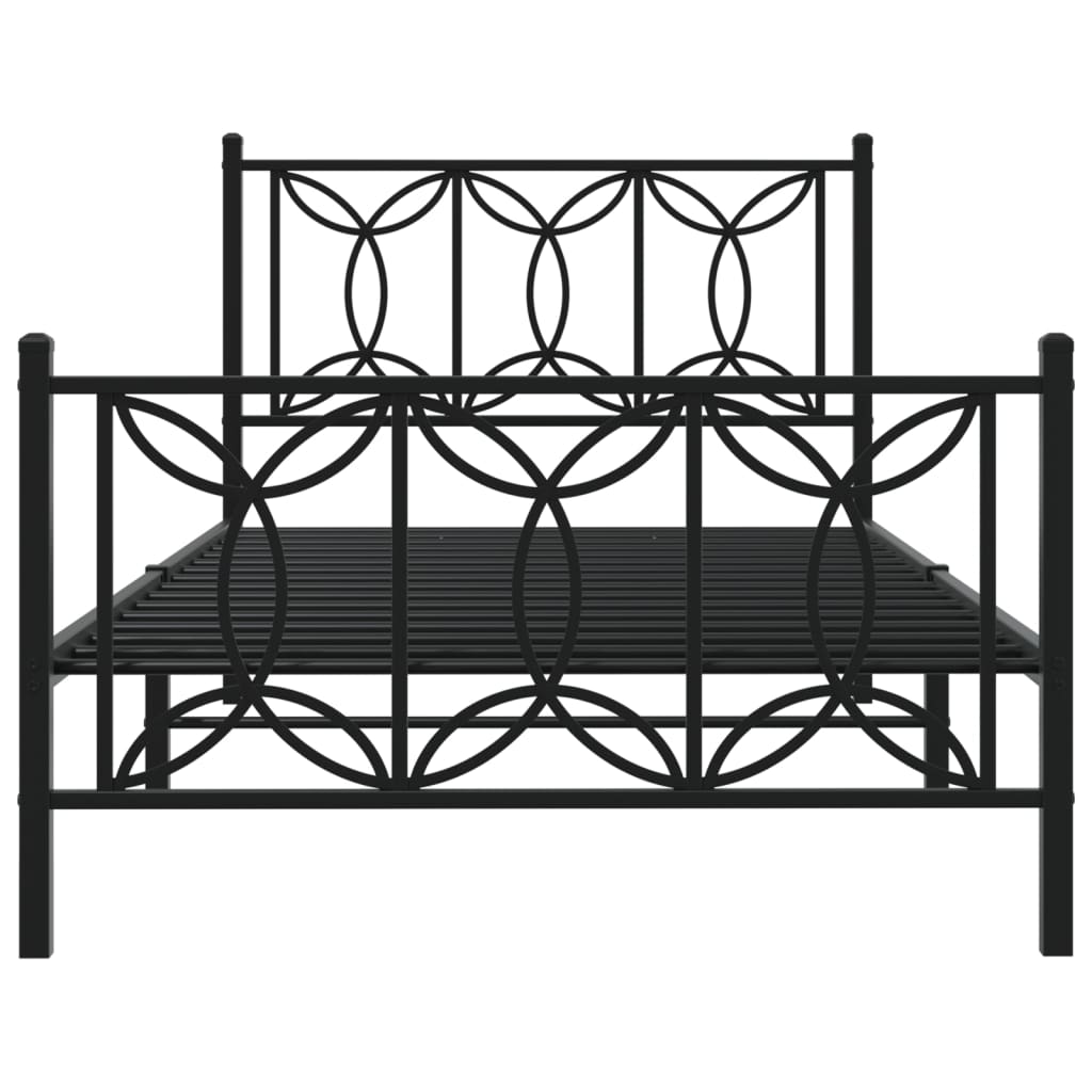 Black metal bed frame with circular pattern headboard and footboard