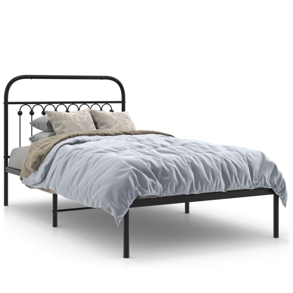 White metal twin bed frame with decorative headboard