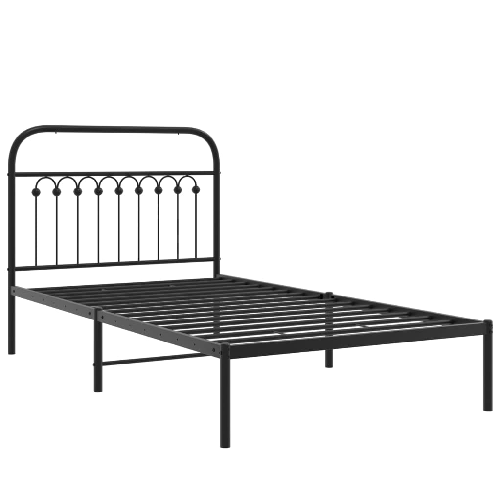 Black metal queen bed frame with arched headboard and matching footboard