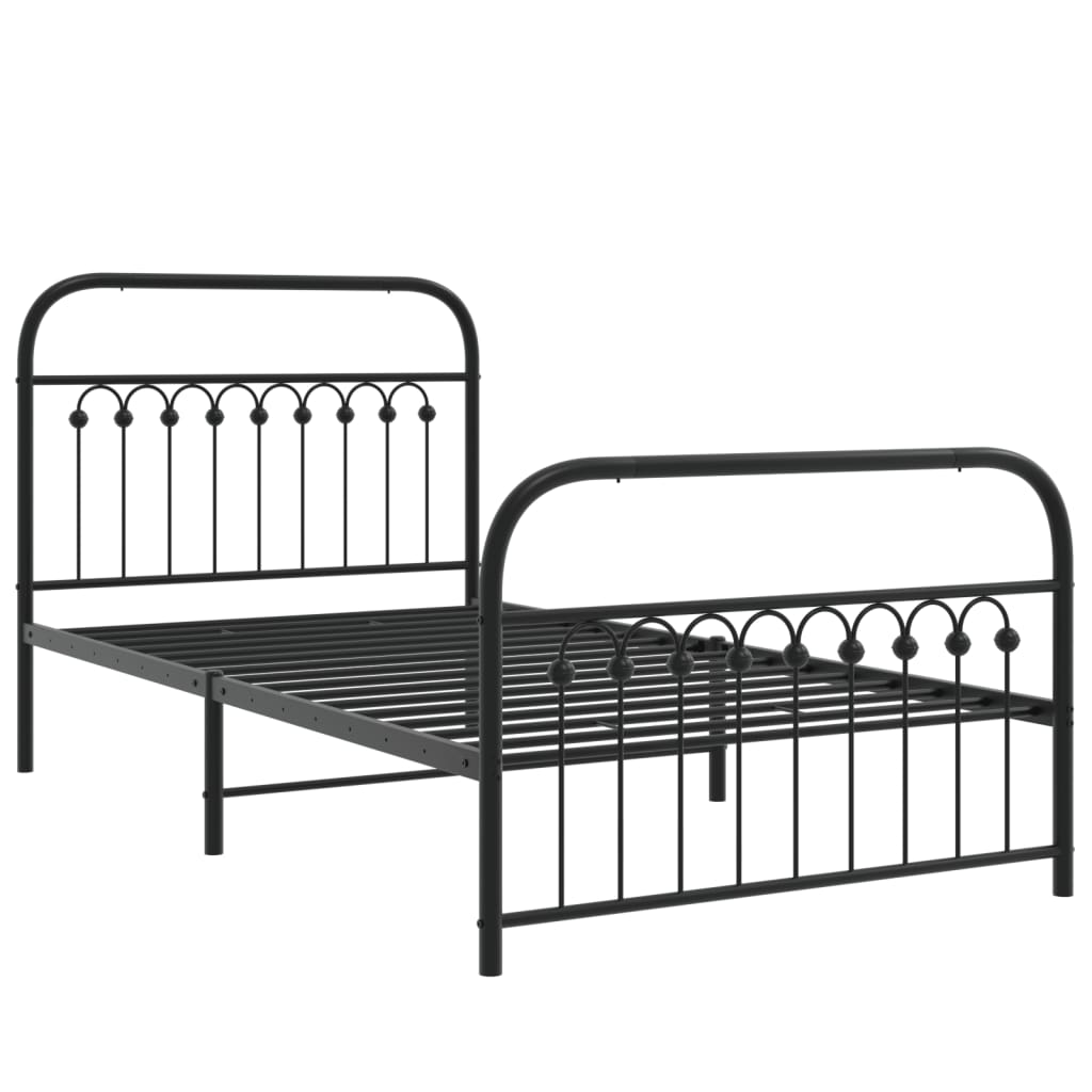 Black metal full size bed frame with ornate headboard and footboard