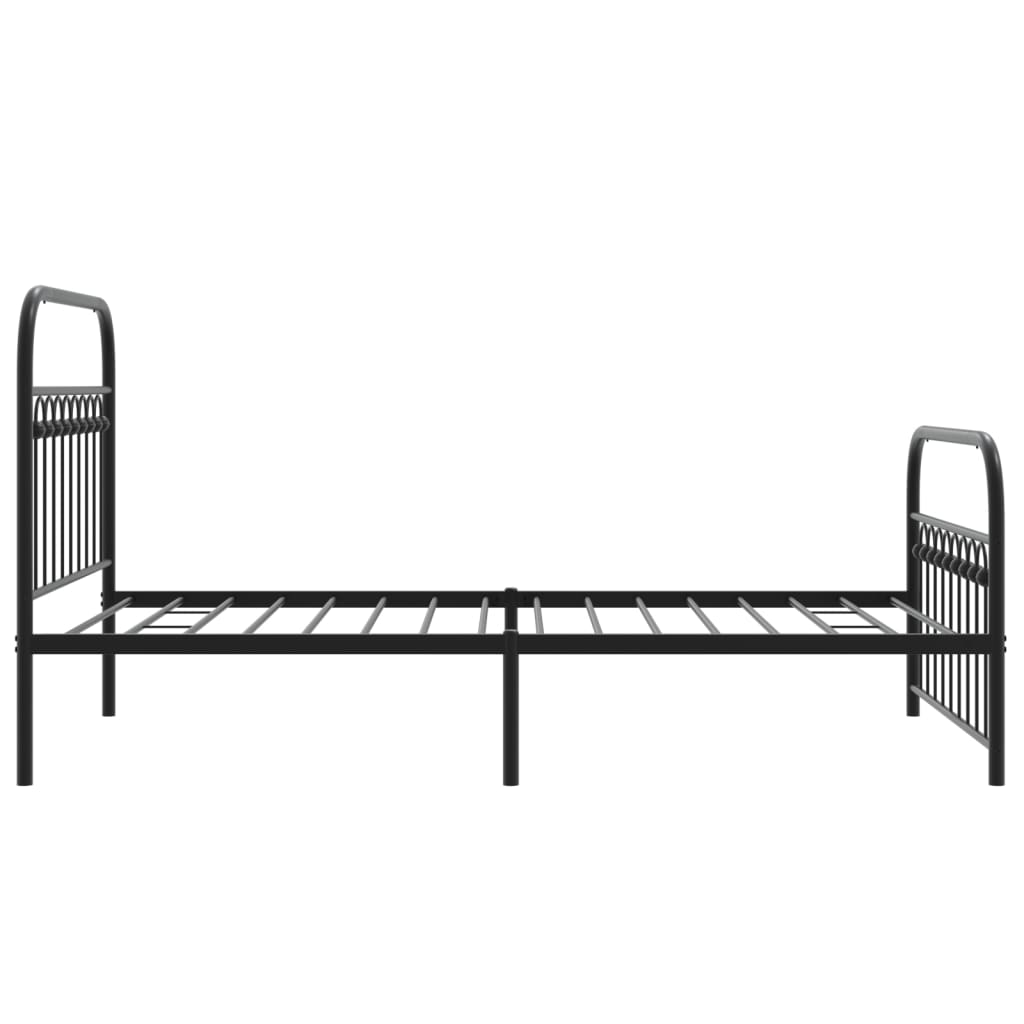 Black metal twin bed frame with ornate headboard and footboard