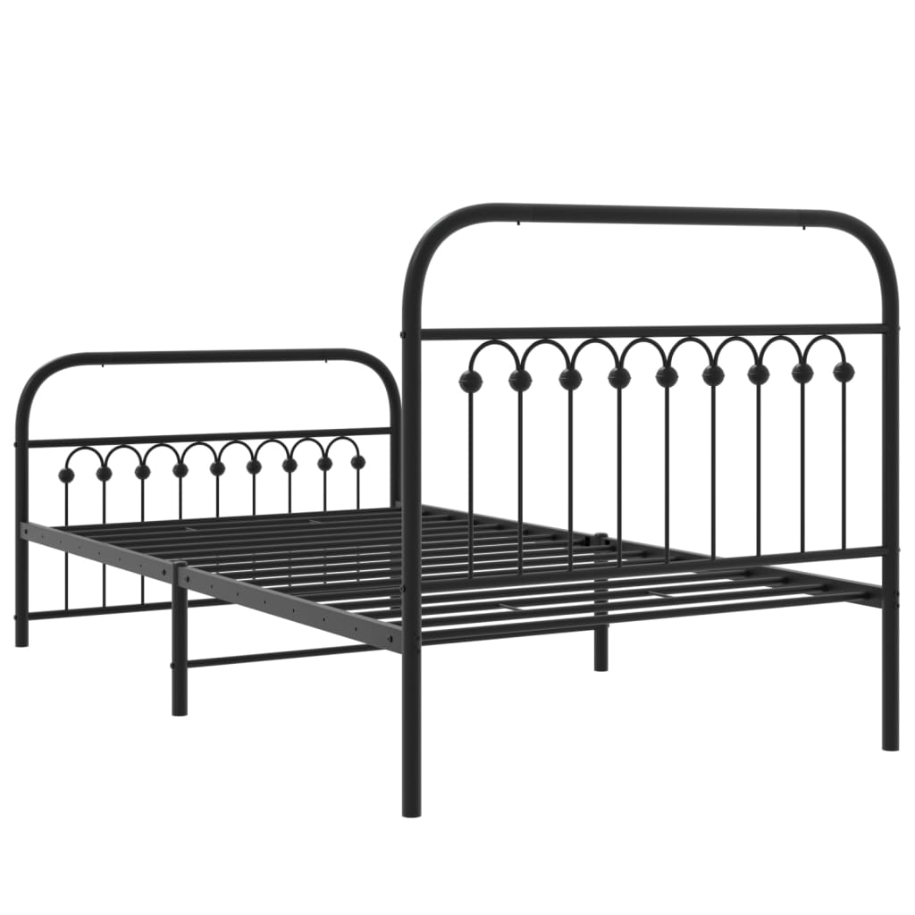Black metal twin bed frame with decorative headboard and footboard