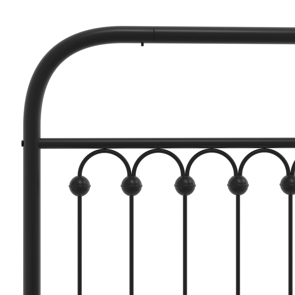 Black metal twin bed frame with decorative finials