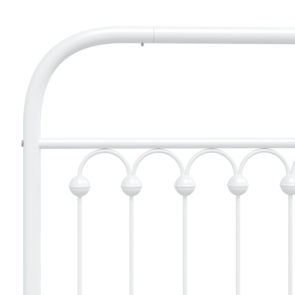 White metal bed frame with decorative headboard and footboard
