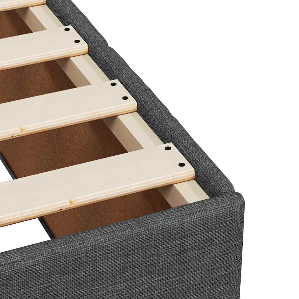 Upholstered grey bed base with wooden slats